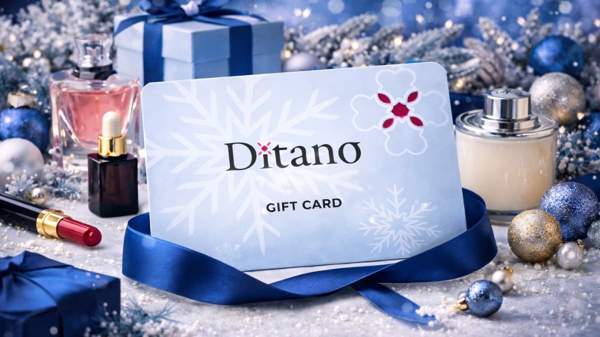 Ditano gift card displayed with luxury perfume bottles and holiday gift packaging