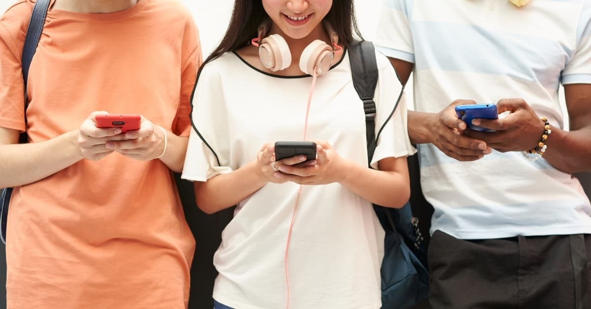 Delta Mobile users checking smartphones while commuting, showing everyday mobile data usage